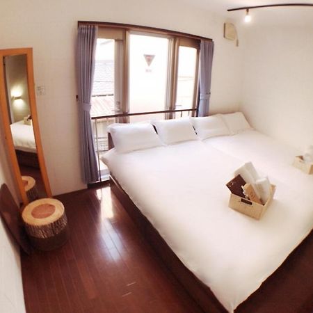 Osaka Sinsei Guest House Exterior photo